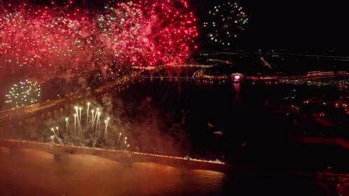 The Aerial Video the Huge and Beautiful Show Fireworks Over the Neva River Water Area on Annual