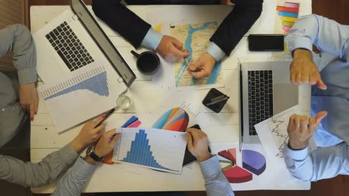 Company Boss Explaining a New Project Strategy to Employees at Corporate Meeting at Office