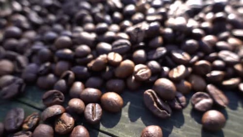 Macro Shot of Coffee Beans on Wooden Surface