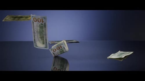 Amerikanische 100-Dollar-Scheine fallen auf eine reflektierende Oberfläche - MONEY 0039