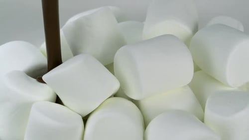 Melted Chocolate Poured Over Marshmallows Deliciously