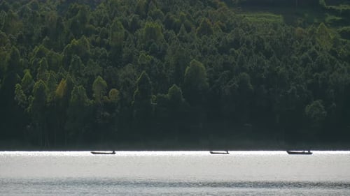 Boats sailing on a lake