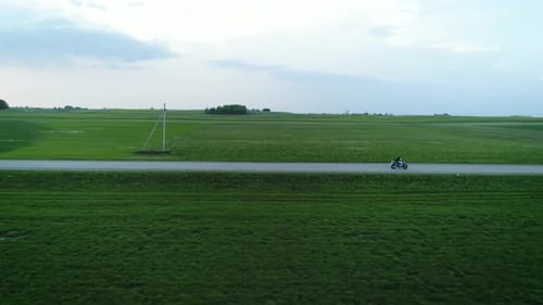 Aerial Of Motorcycle Ride On Countryside Road