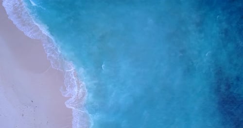 Wide drone copy space shot of a summer white paradise sand beach and aqua blue water background in c