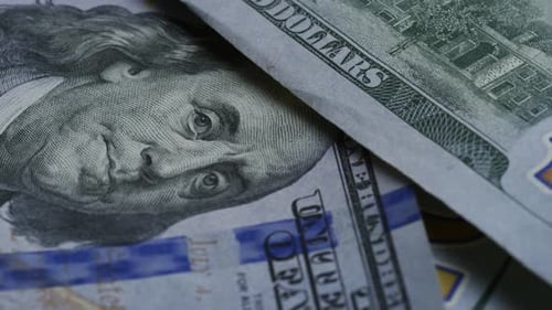 Rotating stock footage shot of $100 bills - MONEY 0139
