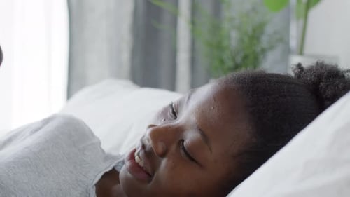 Face of Black Woman Using Smartphone