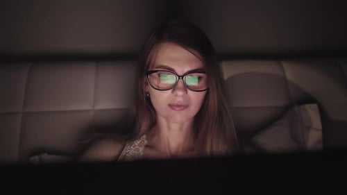 Attractive Young Businesswoman Working at Night Via Computer at Office With, Closeup of Hipster