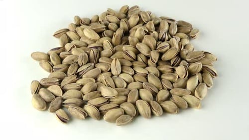 Pile of Pistachios on a White Background
