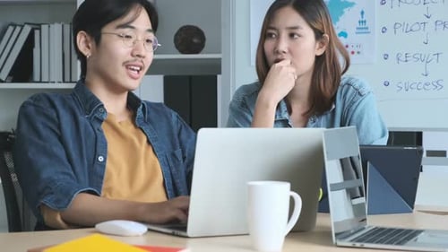 Asian colleague male and female friend casual dress meeting