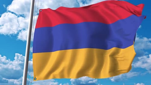 Armenia National Flag Waving in Wind Against Blue Sky