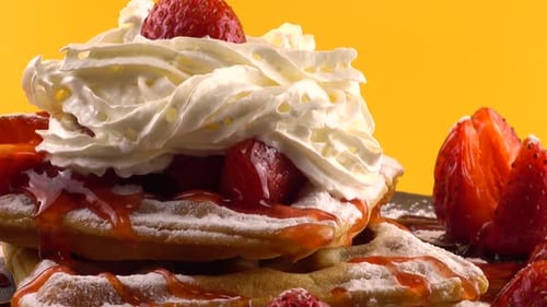 Delicious Waffles with Strawberries and Whipped Cream