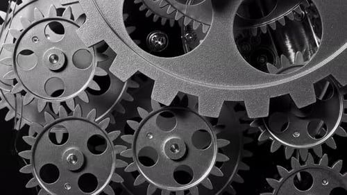 Silver Gears Turning in Close-Up Macro Shot