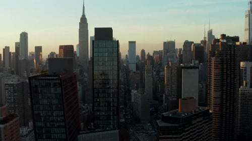 Elevated View of Various High Rise Buildings in City at Dusk