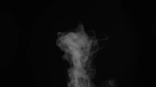 Swirling White Smoke on a Black Background