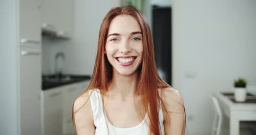 Smiling Woman Close Up in Modern Home