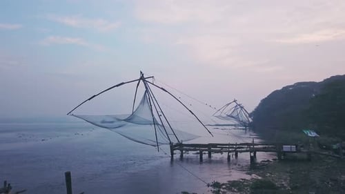 Traditional Chinese fishing nets, Fort Kochi, India. Aerial drone view at sunrise Traditional Chinese fishing nets, Fort Kochi, India. Aerial drone view at sunrise