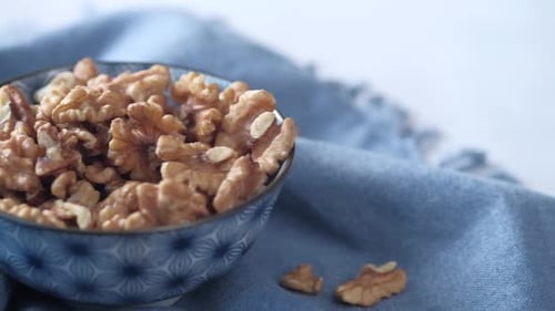 Walnut on a Plate on Table Close Up