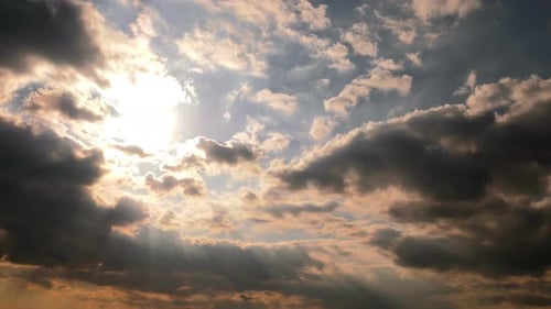 Dramatic Clouds with Sun Rays and Golden Light