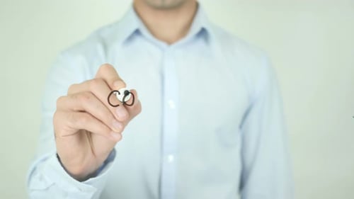 Writing the Word Confidence on a Clear Surface