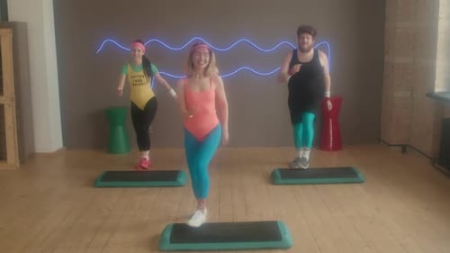 Energetic Aerobics Workout with Three Young Adults