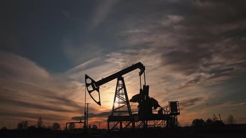 Oil Pump Silhouette at Sunset