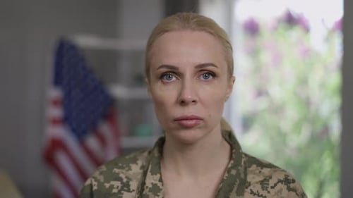 Woman in Camo with American Flag