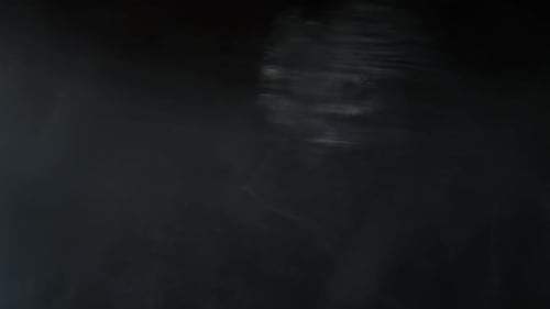 Abstract Shimmering Light Patterns on Dark Background
