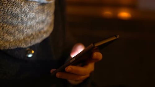 Midnight Girl Uses A Smart Phone 25