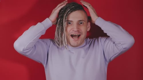Man Reacts to Surprise in Close Up Studio Shot