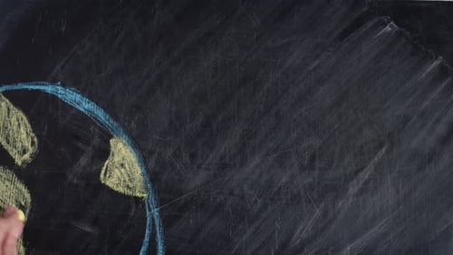 Blackboard Human Hand Draws Globe and Little People Holding Hands Theme Lesson of Peacefulness and