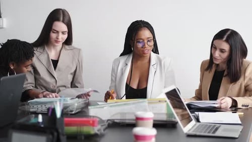 Business Multi Racial Women Working in the Office