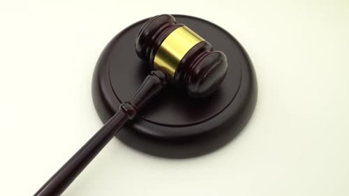 Judge's Hammer Revolves on the Stand. View From Above