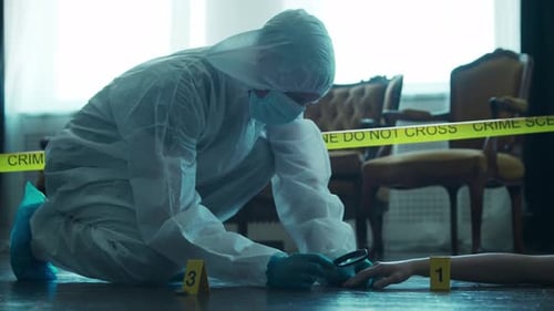 Investigator Examining Crime Scene with Magnifying Glass