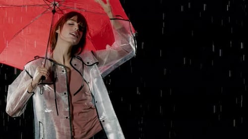 Beautiful Woman Dancing In The Rain