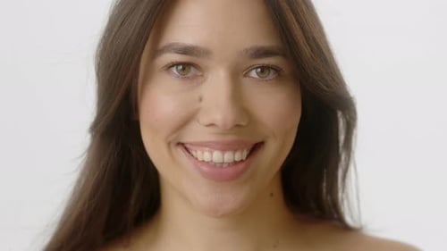 Beautiful Woman Smiling in Close Up Portrait