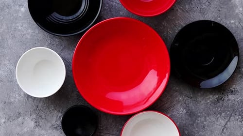 Colorful Plates and Bowls Flat Lay Arrangement