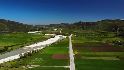 Scenic Aerial View of River and Rural Farmland