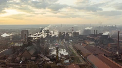 Aerial Hyperlapse Time Lapse, Steel Factory Pipes During Sunrise Time