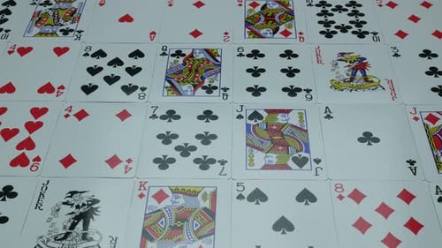 Playing Cards Laid Flat on Table