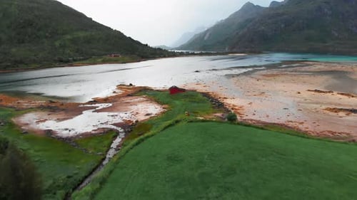 Red house on coast of Lofoten Islands
