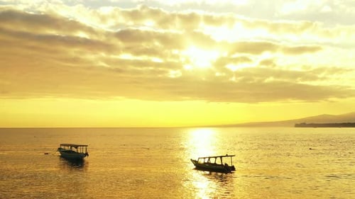 Tropical birds eye clean view of a sandy white paradise beach and blue ocean background in 4K