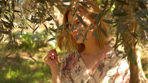Woman Posing in Garden Setting