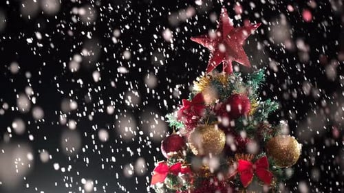 Christmas Tree with Ornaments and Falling Snow