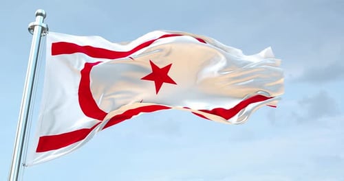 Realistic Northern Cyprus Flag Waving Against Blue Sky