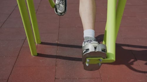 Legs Exercising on Outdoor Fitness Equipment