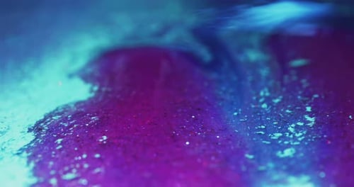 Swirling Glittery Liquid Abstract in Blue and Purple