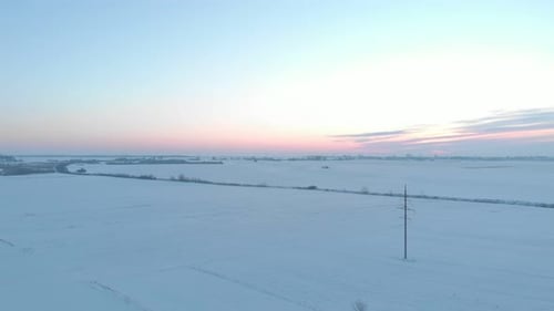 Winter Field At Sunset