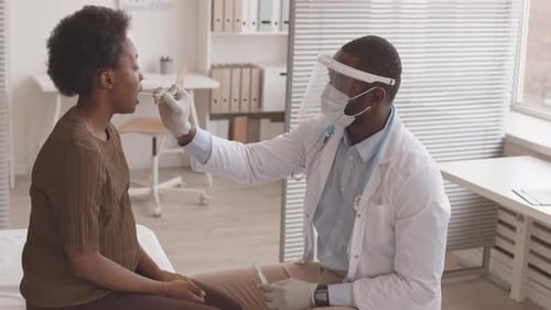 Pregnant Woman Being Tested for Covid