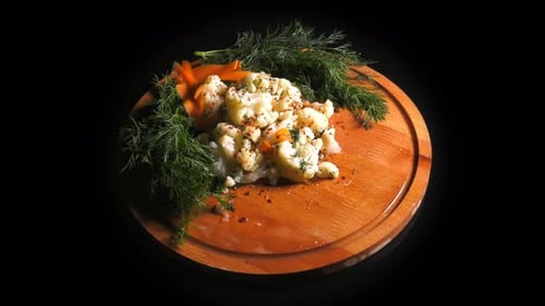 Cauliflower on a Platter with Carrots and Dill