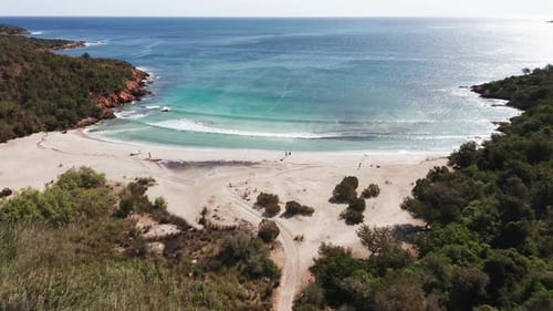 Aerial View of White Coastal Sand Beach Turquoise and Blue Sea Marine Forest Vegetation Around Red